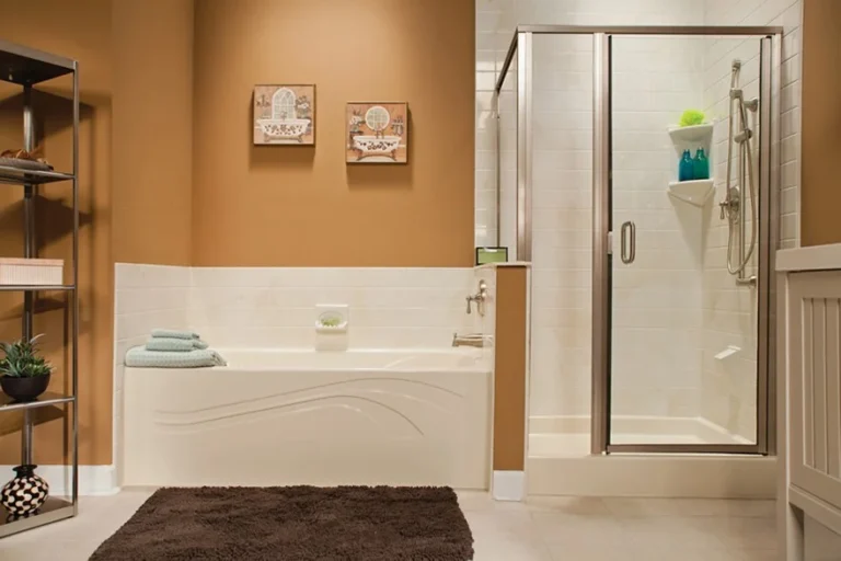 Bathroom with separate bathtub and glass shower enclosure