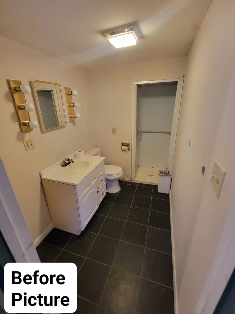 Bethlehem bathroom before remodeling, with the original vanity, lights and shower