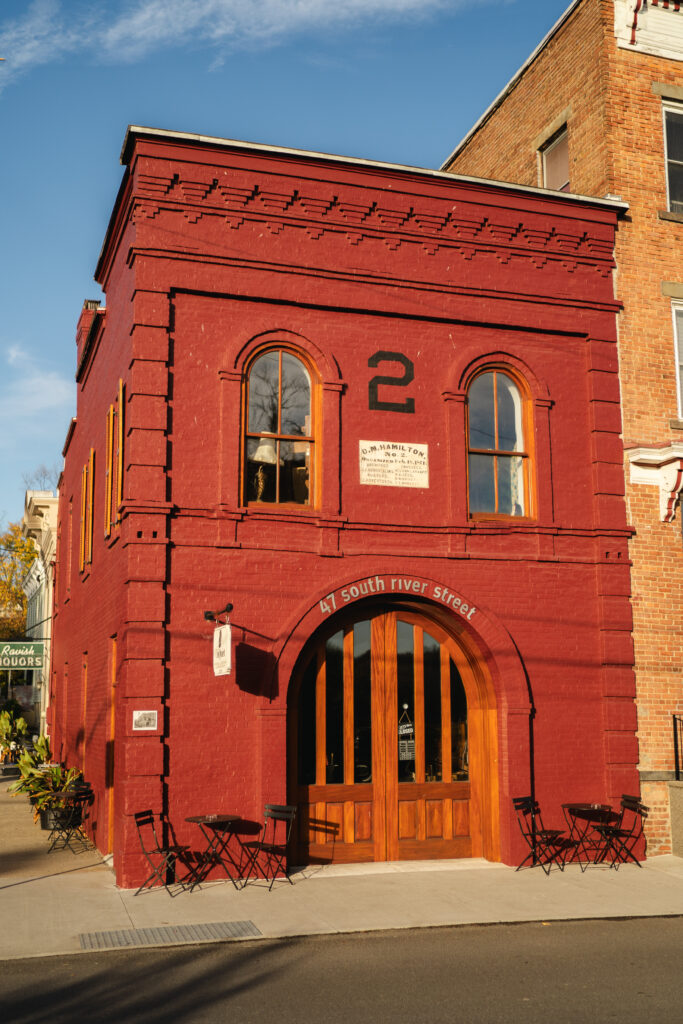 Red brick D. M. Hamilton No. 2 historic building at 47 South River Street in Coxsackie, New York